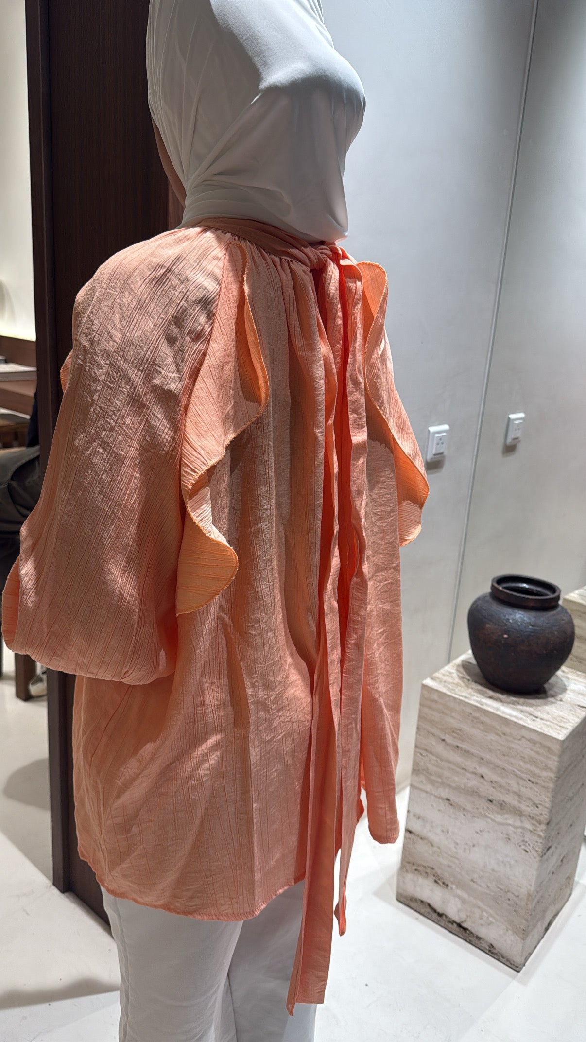 Blouse à volant saumon