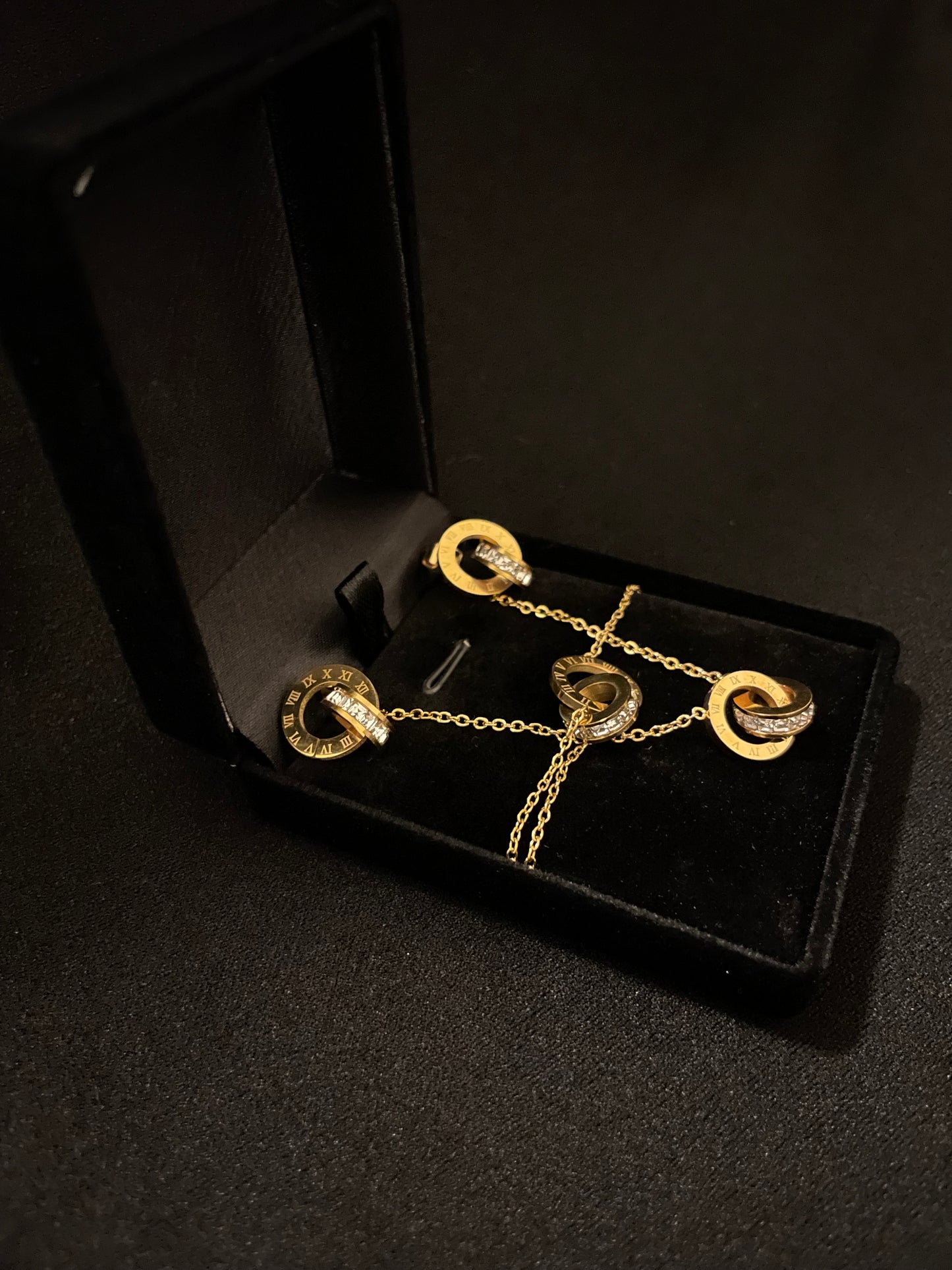 Ensemble bijoux éternité dorée