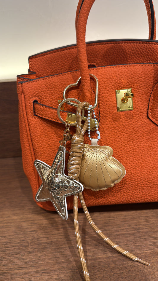 Charm de sac doré