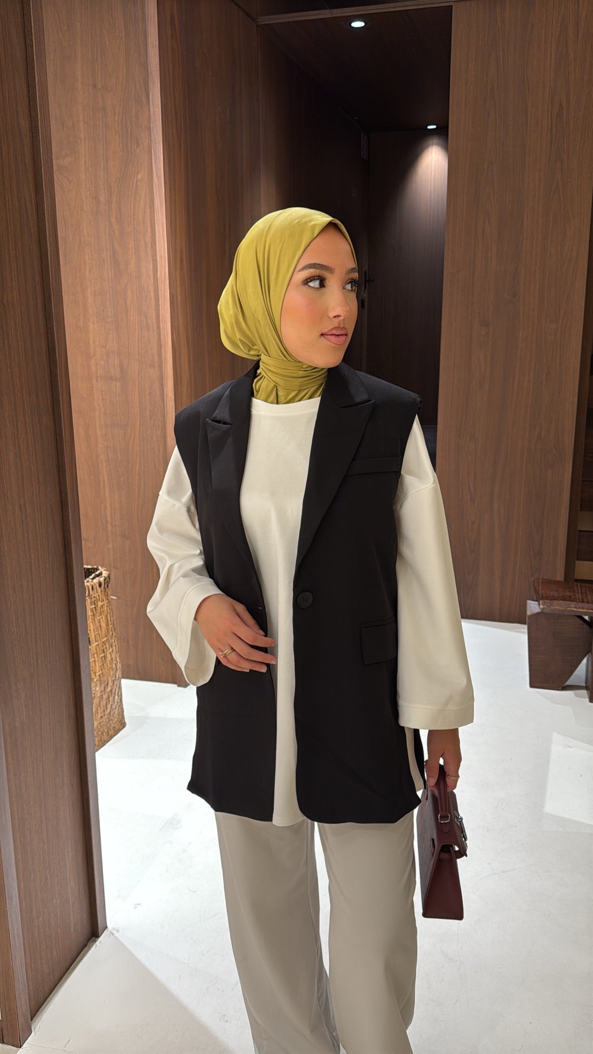 Blazer noir sans manche fente