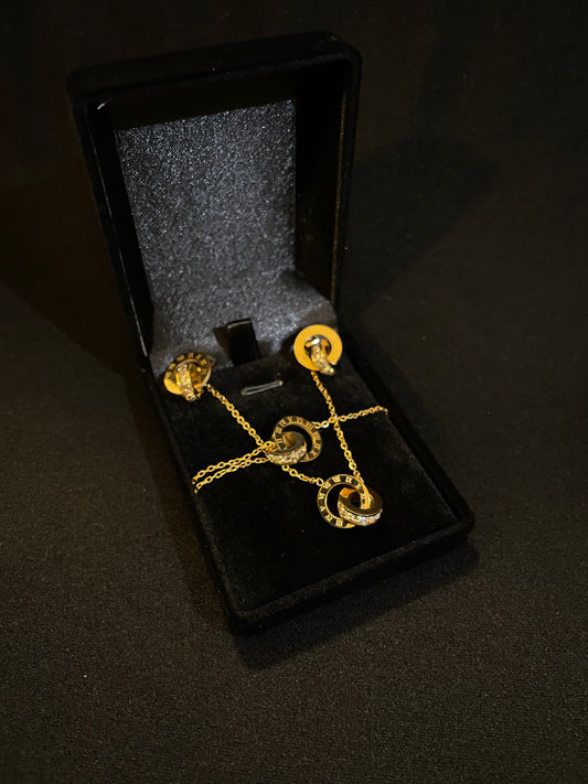 Ensemble bijoux éternité dorée