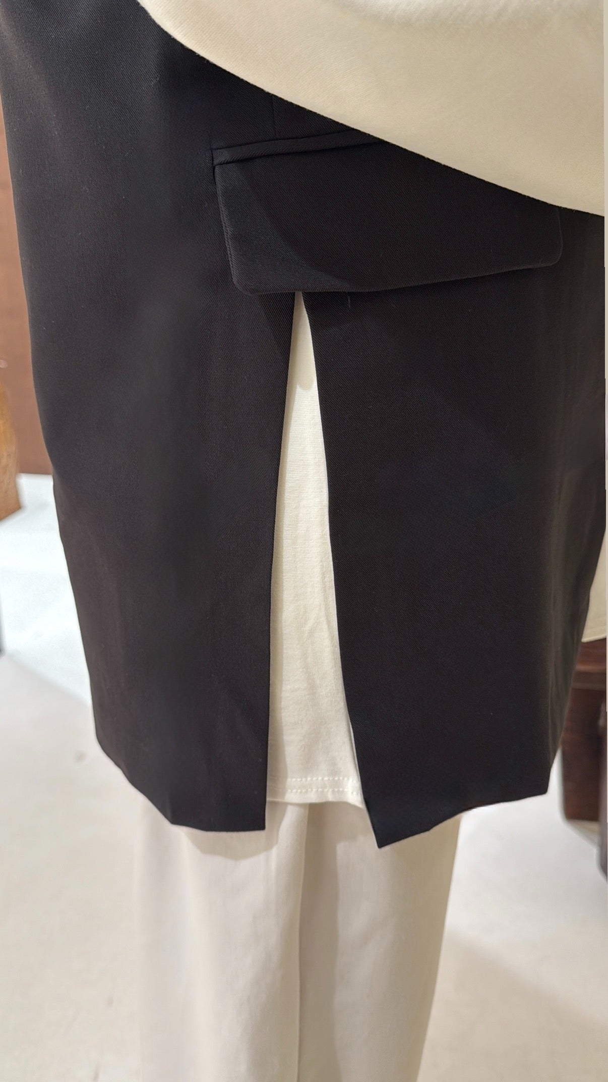 Blazer noir sans manche fente